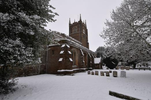A photograph of Blunham Church in the snow