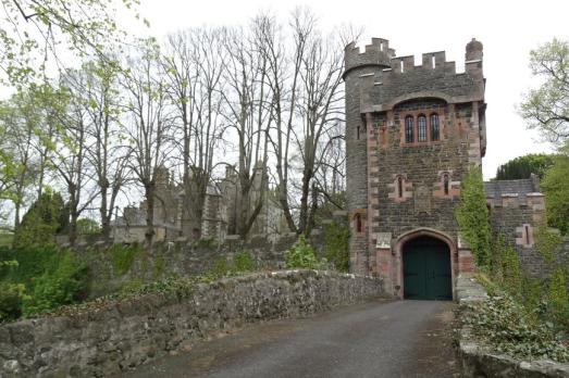 A gatehouse next to some trees