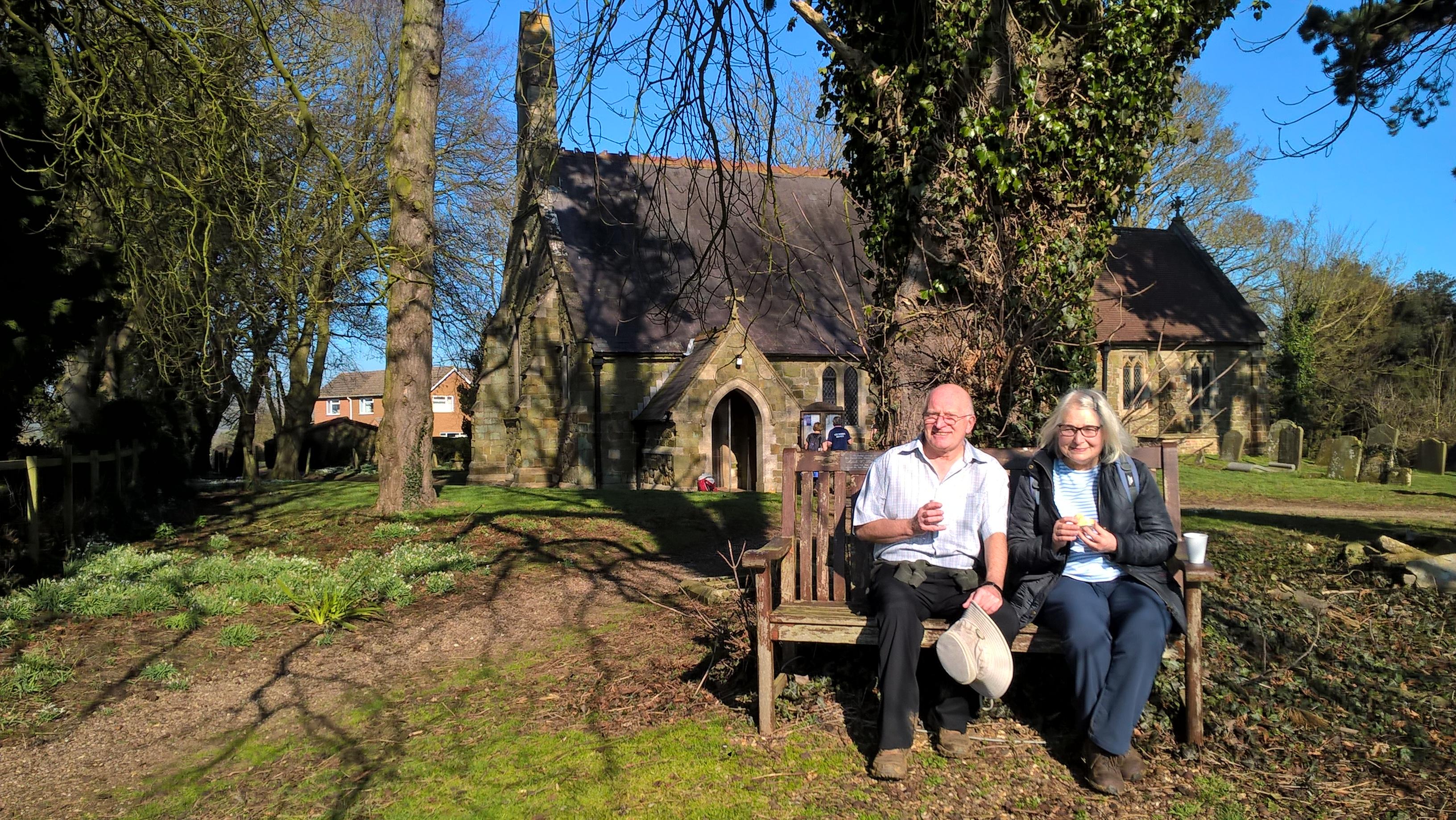 people sat outside church