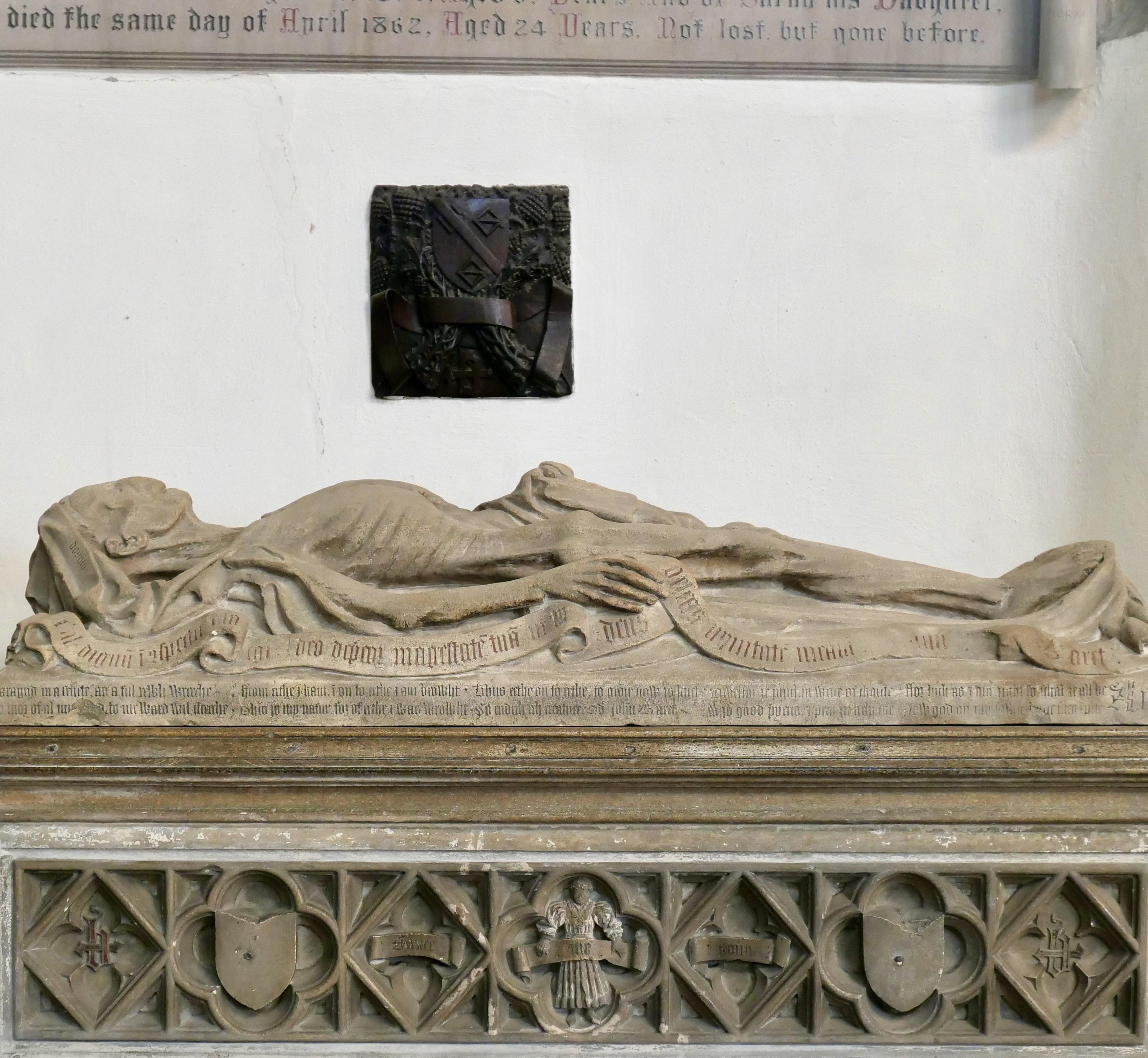 A photograph of a cadaver tomb inside a church