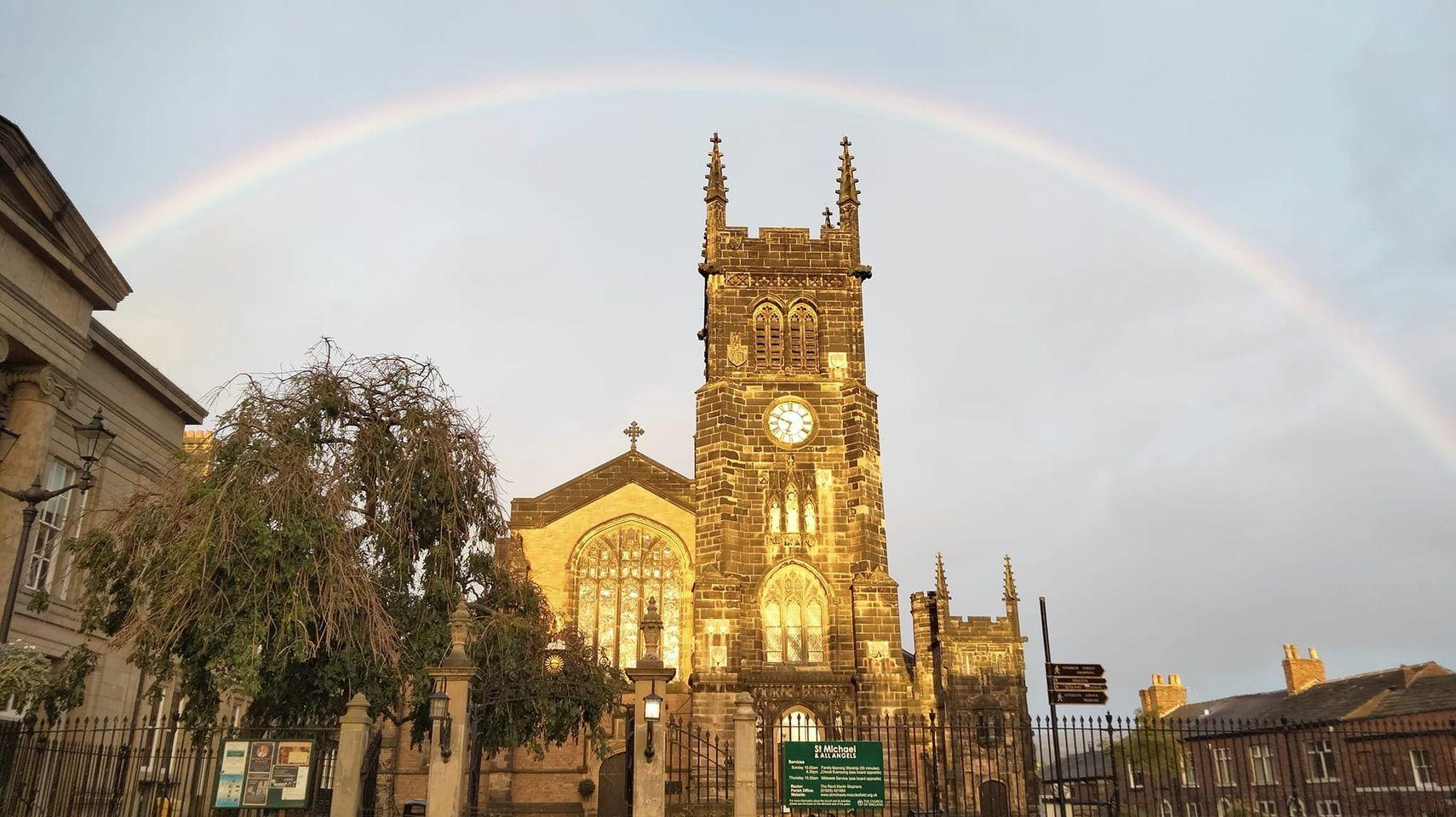 A rainbow over the top of St Michael & All Angels Church