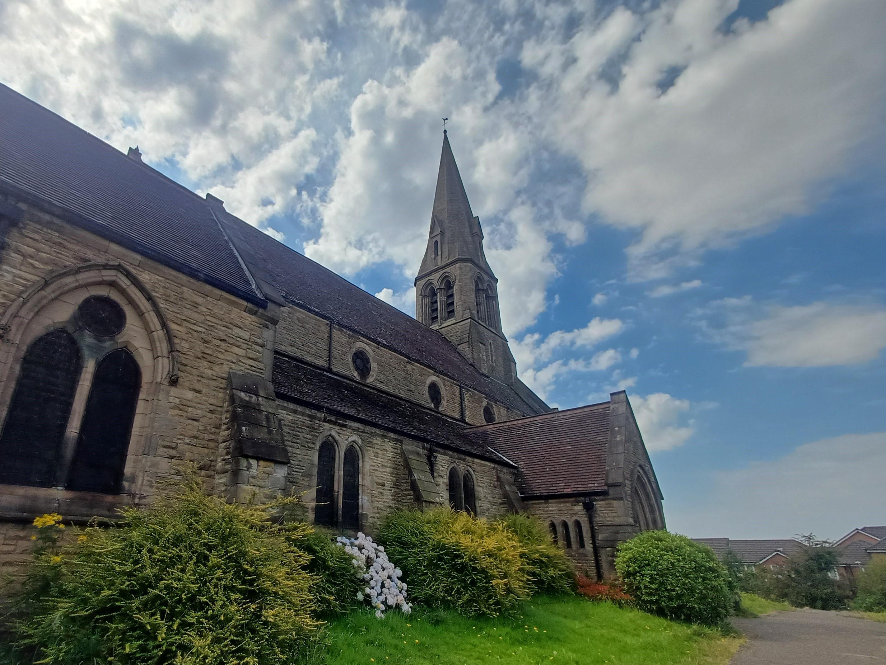 Church in front of a cloudy sky