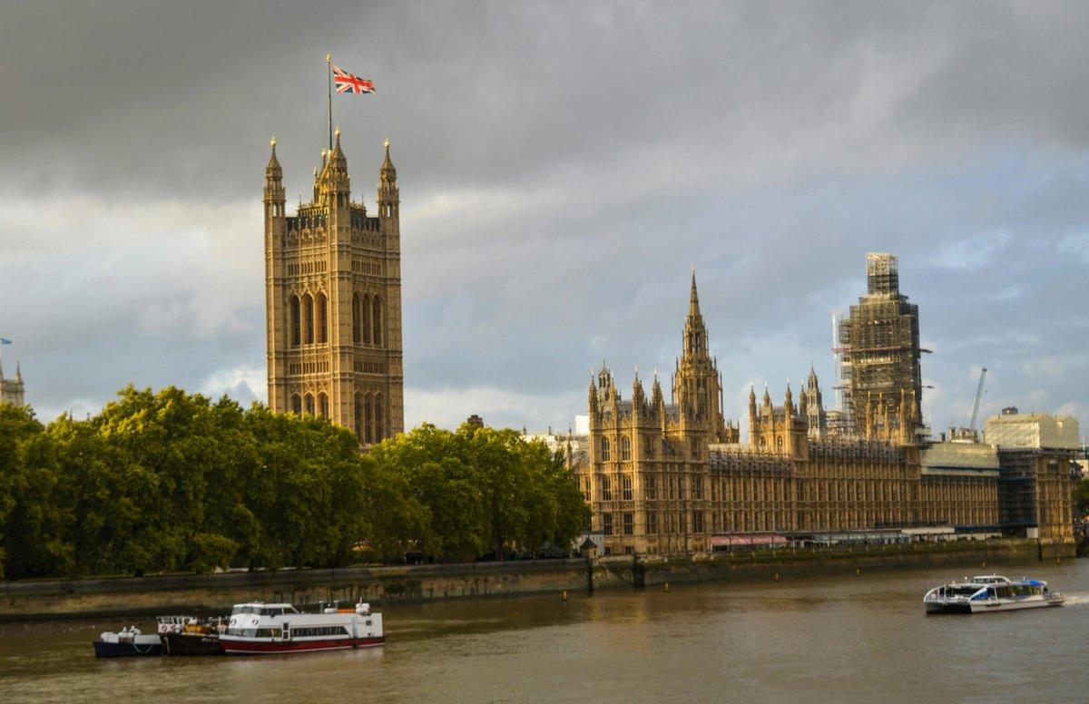 A photograph of the Houses of Parliament, taken from the River Thames