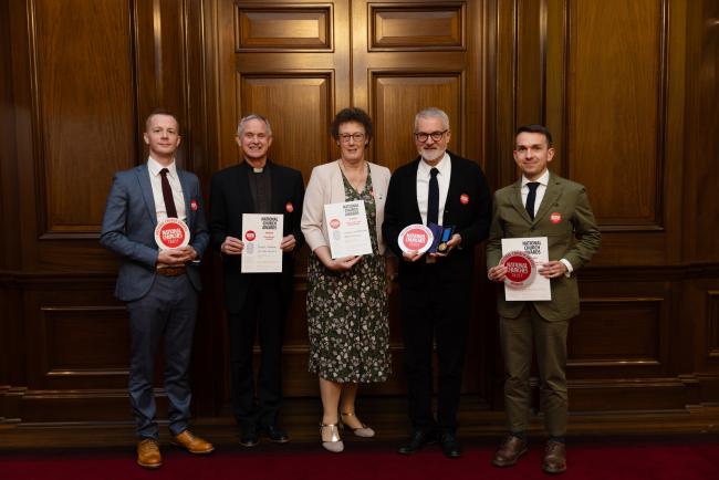 Image shows a group shot of winners of the architecture awards