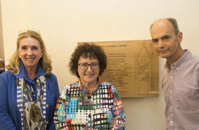 [From left to right] Denise Lewis-Poulton from the National Lottery Heritage Fund and local representative Elin Jones AM with Peter Garson at St Michael’s Church celebrating the completed project.