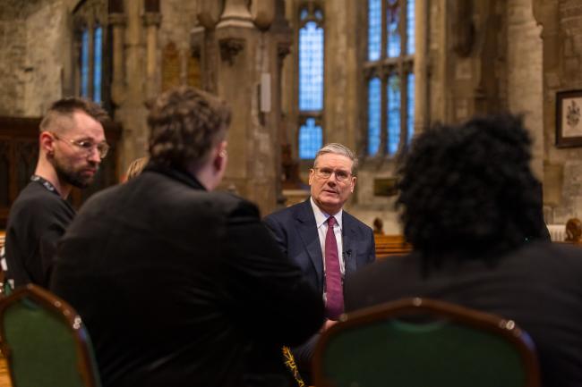 A photograph of Keir Starmer inside a church